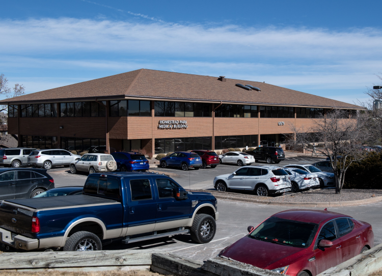 Side view of office building from parking lot
