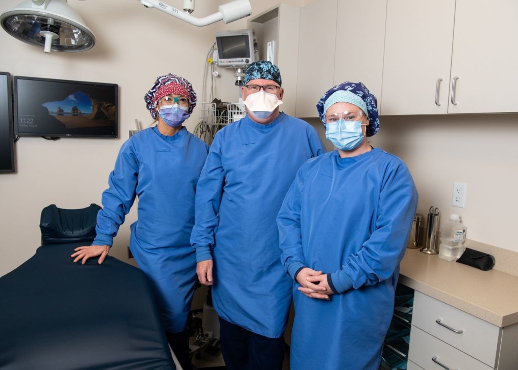 Staff in their personal protective equipment